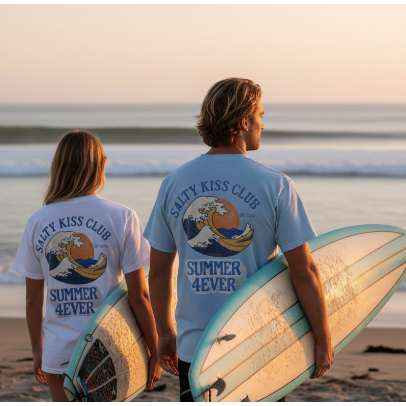 Beach lifestyle photo with couple wearing matching graphics