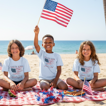 Kids at 4th of July beach picnic wearing USA t-shirt