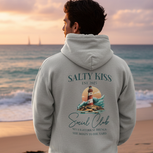 Lighthouse hoodie man back view beach lifestyle photo