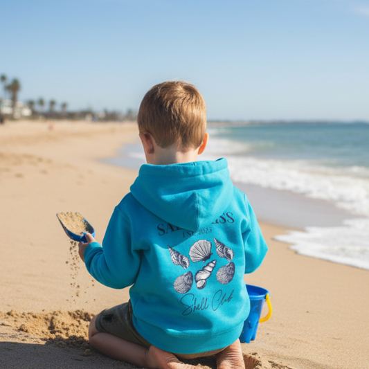 Youth wearing seashells hoodie at beach